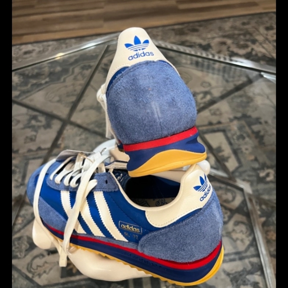 Adidas Blue and White Trainers with Red and Yellow Accents